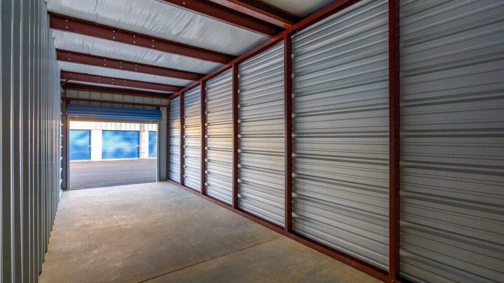 Inside of a clean, spacious drive-up storage unit.
