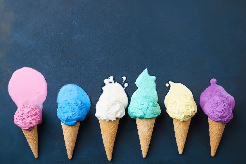 Different colored ice cream cones melting side by side.