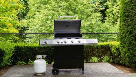 Gas grill on a patio.
