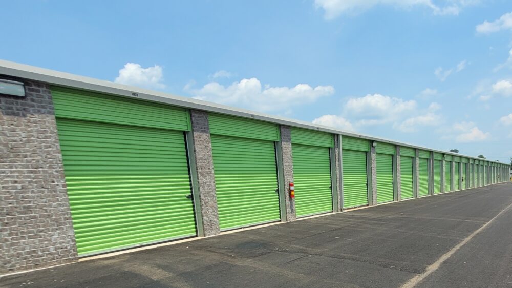 Silo Self Storage exterior drive up yellow green doors