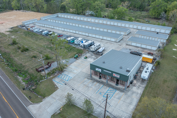An aerial view of Bedico Storage with drive-up access storage units and vehicle parking storage.