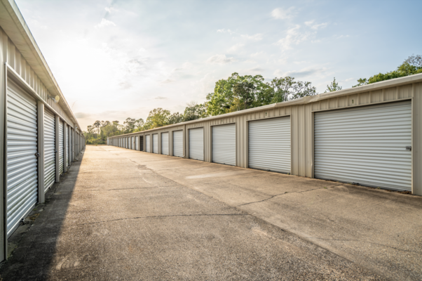 An aisle of drive-up access storage units at Bedico Storage.