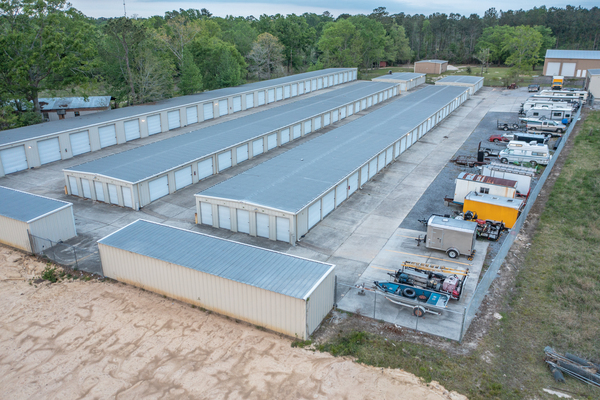 An aerial view of Bedico Storage with drive-up access storage units and vehicle parking storage.