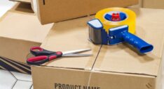 Tape, scissors, and moving boxes.