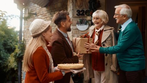 Two parents welcome their kids into their home for the holiday season.