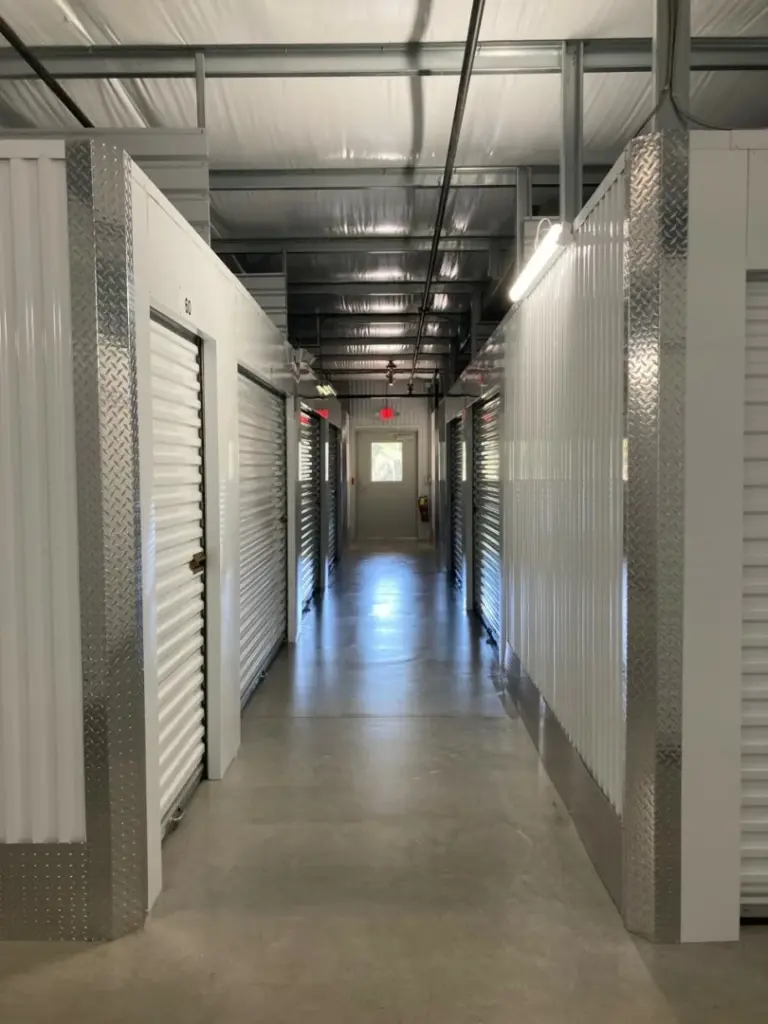 A hallway of indoor, climate controlled storage units.