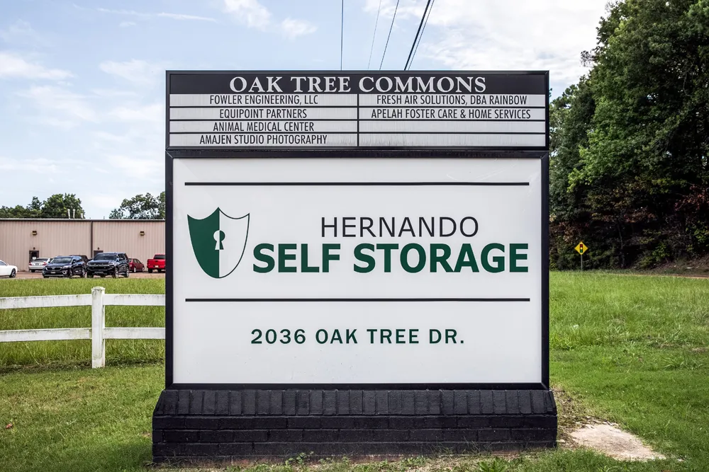 Hernando Self Storage welcome sign with facility in the background