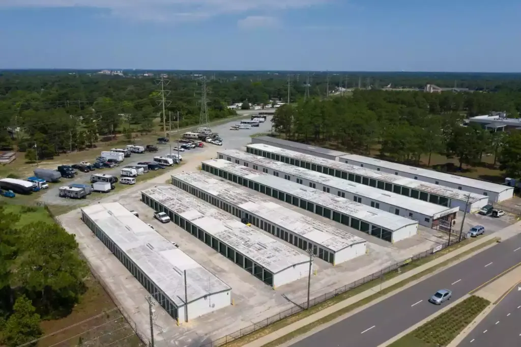 Aerial view of an outdoor storage facility with parking spaces