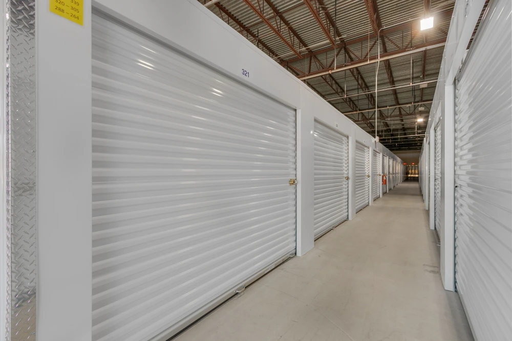 Interior hallway of white storage units.