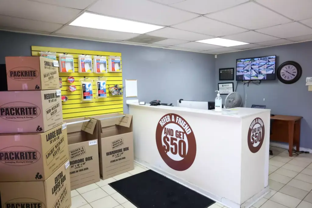 Interior lobby of a storage facility with boxes.