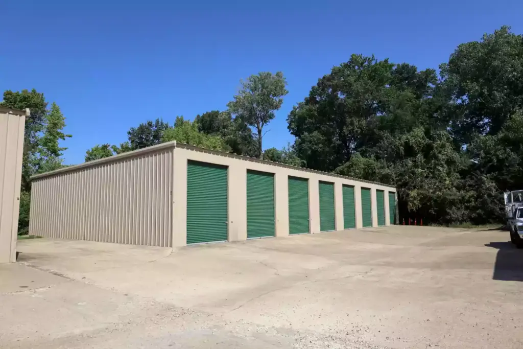 Outdoor storage units with green doors