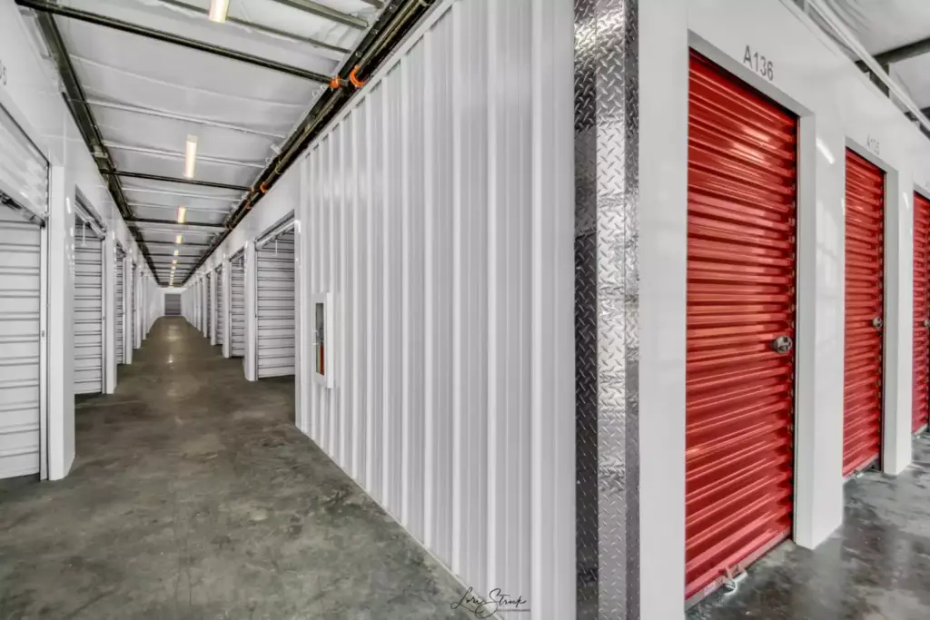 Red and white indoor storage units.