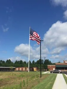 American flag blowing in the wind.