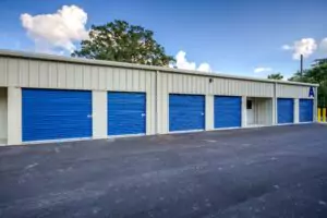 Row of blue outdoor storage units.