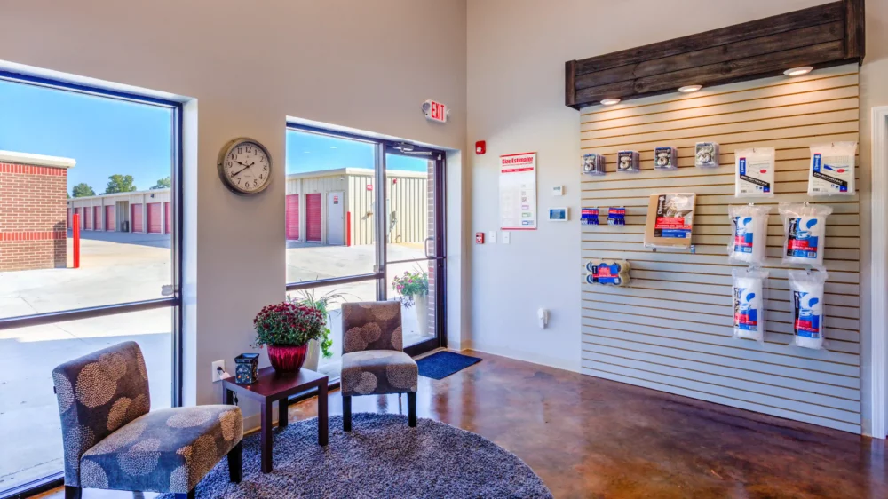 Indoor lobby of a storage facility with supplies for sale