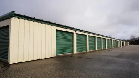 The exterior of a self storage facility with drive-up storage units.